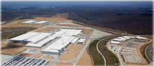 Optimizing Truck Flow and Parking in Automotive Manufacturing Plant Using Simulation – A Case Study