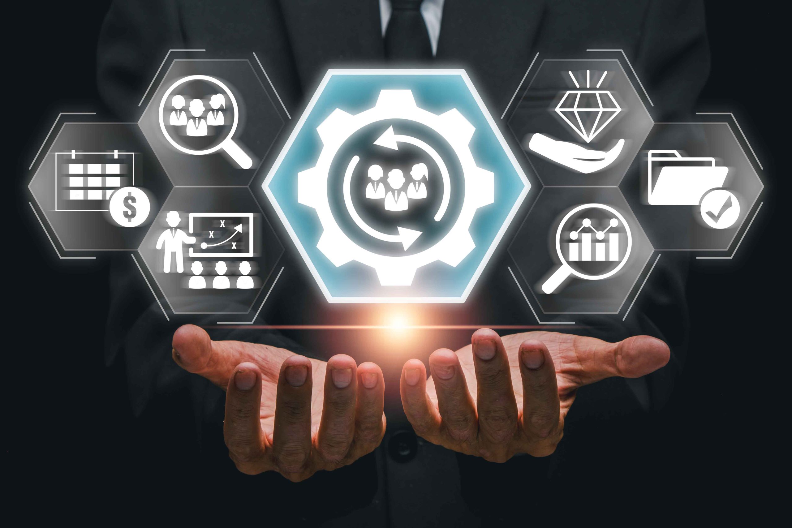 Business professional presenting digital icons related to human resource management, including recruitment, training, analytics, and performance optimization